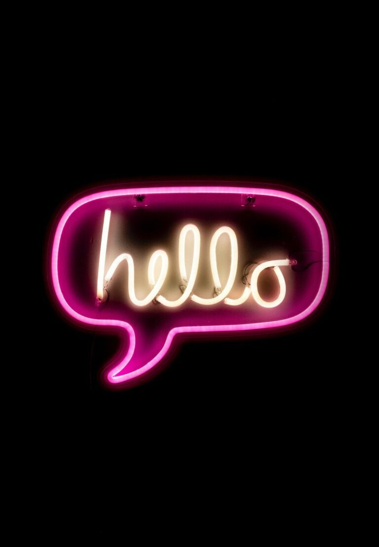 Wordpress web design agency | Hello sign with neon lights